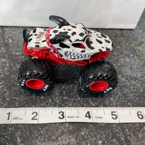 Monster Jam Monster Mutt Dalmatian 1:64 scale die-cast monster truck.